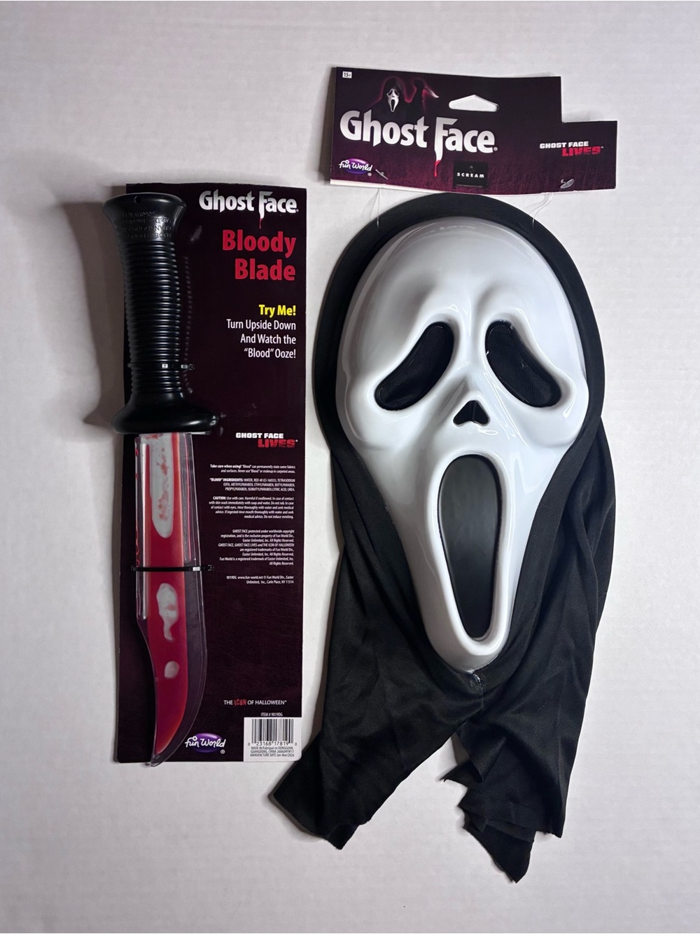 Fun World Scream Ghost Face Lives Mask And Bloody Blade Halloween Costume Set.